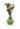 Front view of the Turtle Water Pipe, a green glass pipe with a textured shell pattern, accented by a sprig of leaves.