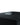 Close-up, angled view of the sleek, black StashBox, showcasing its minimalist design and smooth texture.