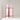 Front view of the Aluminum Metal Storage Jar, a sleek container with a ribbed lid on a light surface.