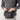 A medium shot displays the Carbon-lined Fanny Pack Travel Pouch worn around a person’s waist, with a visible zipper and dark fabric texture.