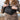 A medium shot shows the Carbon-lined Fanny Pack Travel Pouch worn around a person's waist, against a blurry outdoor background.