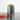 A front view of the Aluminum Metal Storage Jar filled with colorful candies against a plain white background.