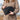 A close-up, angled view shows the Carbon-lined Locking Wallet held in a hand against a blurred outdoor background.