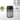 A front view of the Child Resistant Glass Storage Jar, showcasing its clear glass construction against a blurred kitchen backdrop.