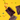 Angled top-down view of colorful jellybeans spilling from a patterned pouch on a bright yellow backdrop with an ONGROK Color-Coded Mylar Bags pouch partially open.