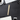 A close-up, angled view of the Premium Storage Tube resting on a desk alongside office supplies.