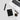 Overhead view of the Premium Storage Tube positioned next to a coffee cup on a white surface.