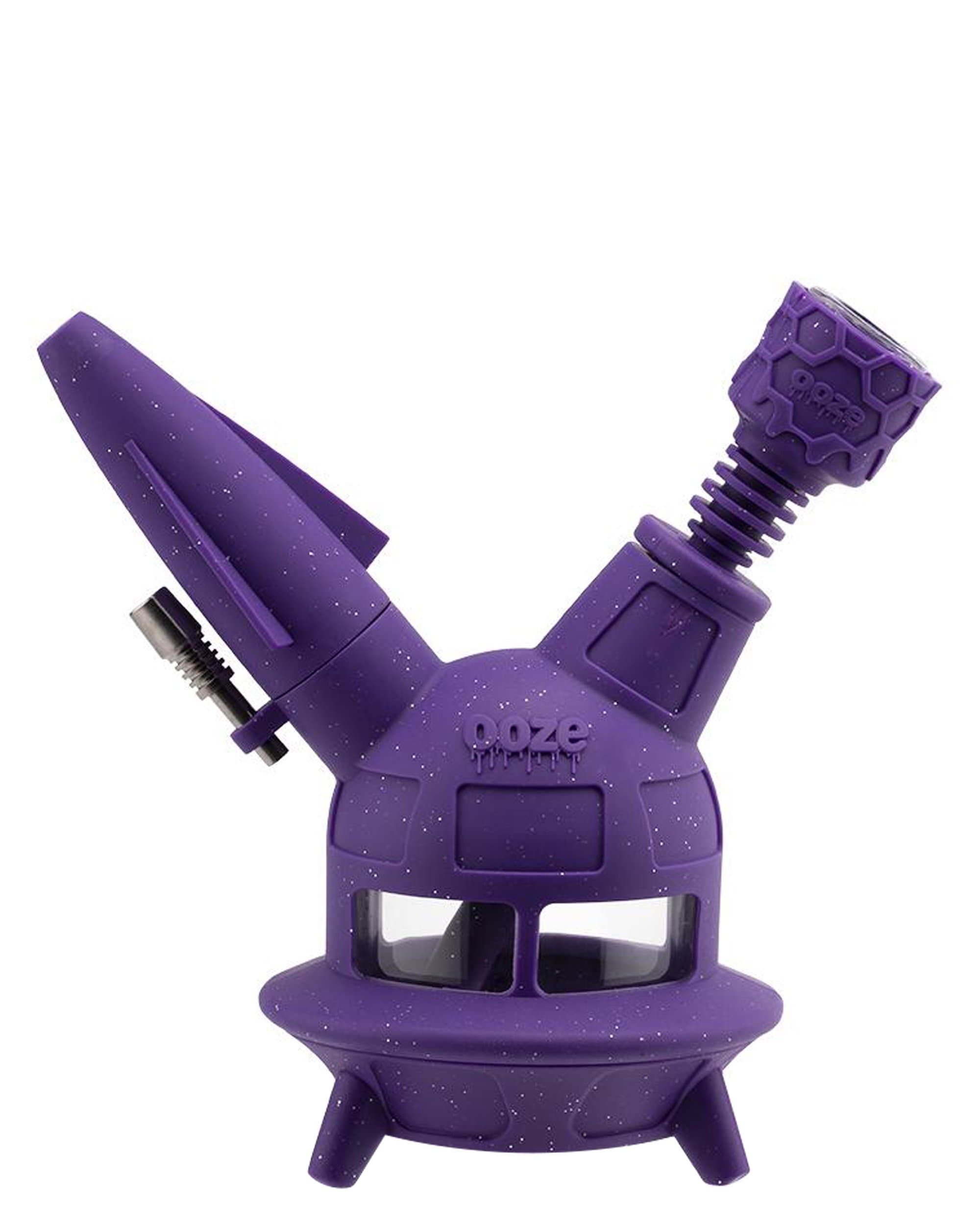 A front view of the UFO Silicone Bong, showing its unique saucer shape and purple hue with a visible mouthpiece and water chamber.