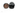 Front view of the 3 Piece Grynder, showing a circular, black grinder with a perforated top surface.